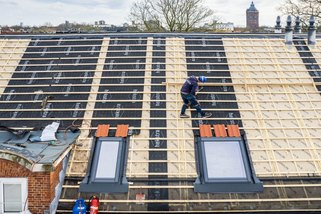 Isolatie toevoegen aan bestaande dakbedekking